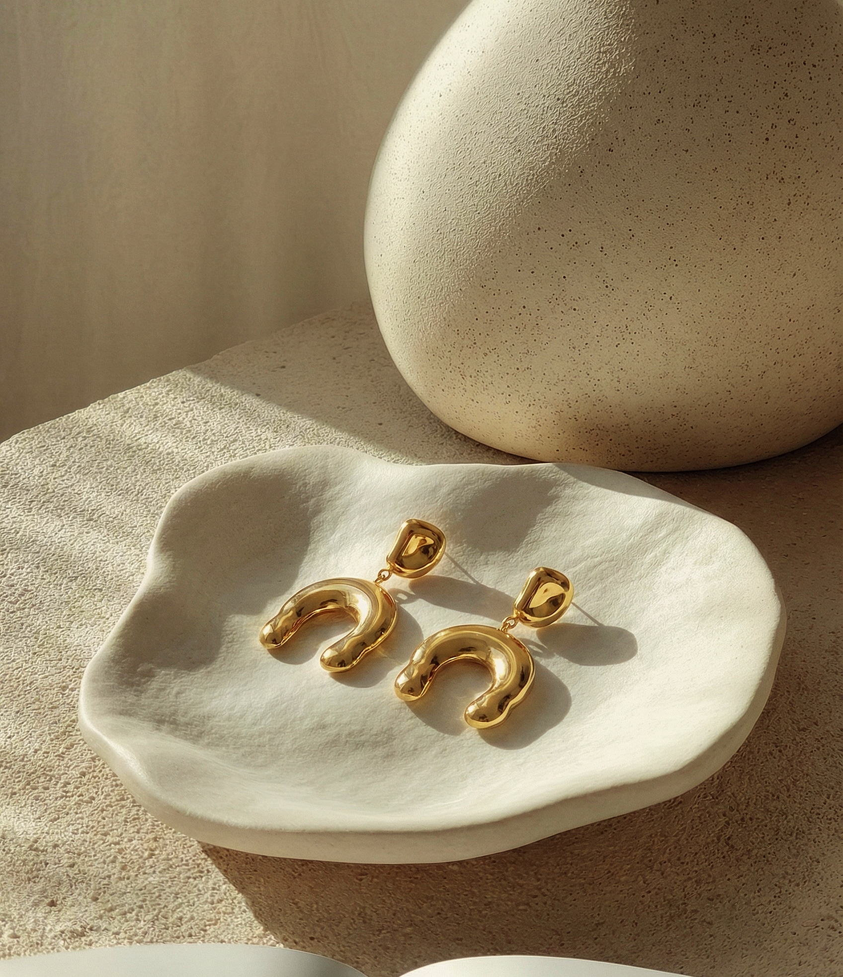 Regal Horseshoe Drop Earrings